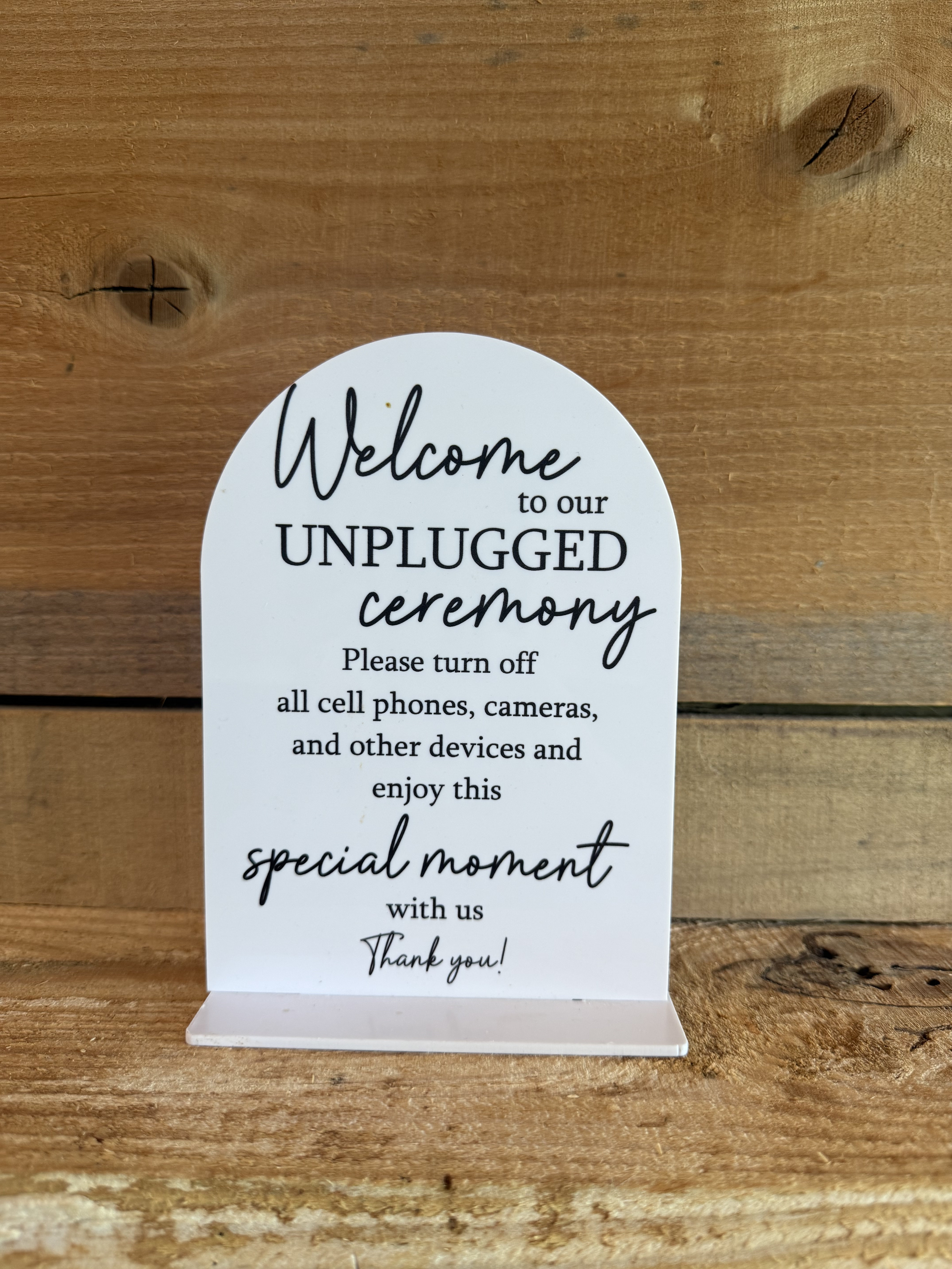 White Acrylic Arched "Unplugged Ceremony" Sign